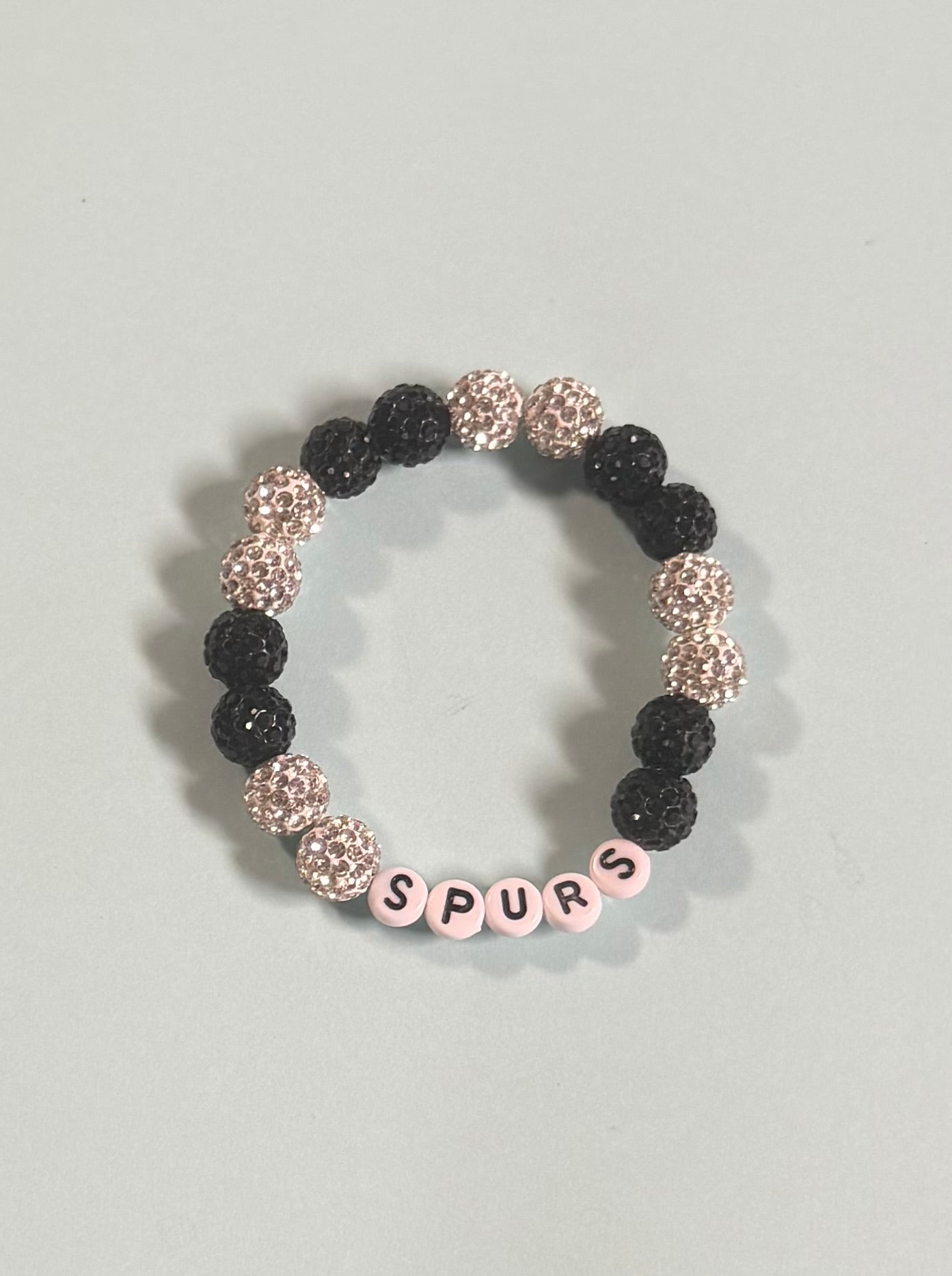 Large silver and black beads with SPURS
