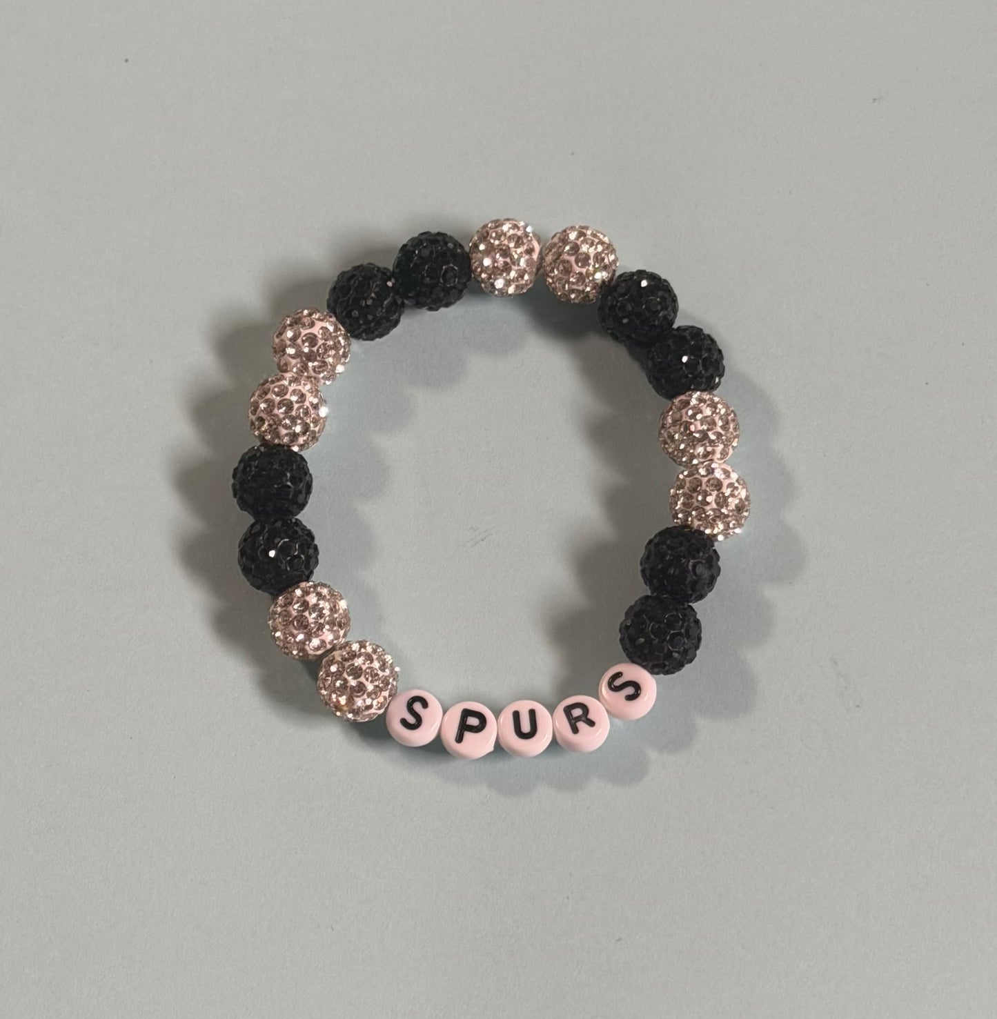 Large silver and black beads with SPURS